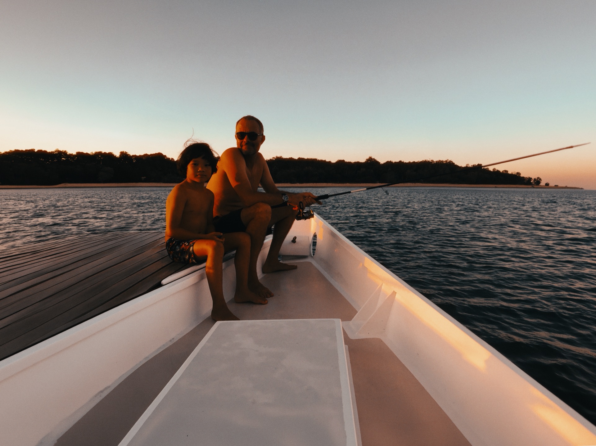 Father and son at sunset